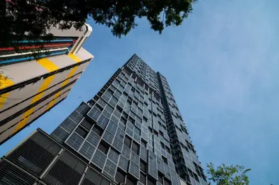 a tall building looking up at the sky at EXPRESSIONZ KLCC BY MANA-MANA in Kuala Lumpur