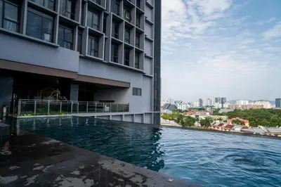 a swimming pool on the side of a building at EXPRESSIONZ KLCC BY MANA-MANA in Kuala Lumpur