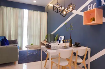 a dining room with blue walls and a table and chairs at S31- 3 Bedroom Robertson at Bukit Bintang with Netflix in Kuala Lumpur