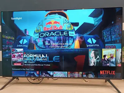 a flat screen tv sitting on top of a table at S27- Bukit Bintang Robertson 3BR Suite with Netflix in Kuala Lumpur