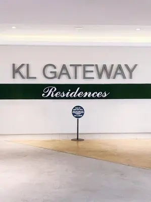 a sign on the wall of a gallery with a sign in a room at PROMO CONNECTED TRAIN 1 Bedroom ABOVE MALL - 5 in Kuala Lumpur