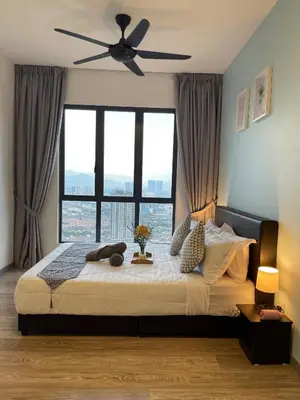 a bedroom with a large bed with a ceiling fan at 7PAX Kepong DesaPark Publika MontKiara 100Mbps in Kuala Lumpur