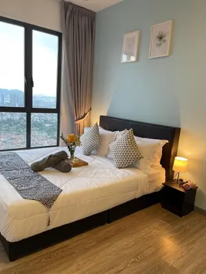 a bedroom with a large bed with a large window at 7PAX Kepong DesaPark Publika MontKiara 100Mbps in Kuala Lumpur
