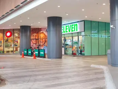 a shopping mall with a sign on the side of it at Stylish KL Suite, KLCC View, Next to LRT, Datum Jelatek By Atlantis Management in Kuala Lumpur