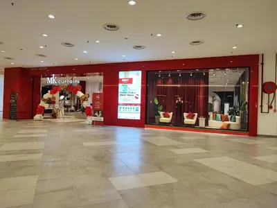 a mall with a store with furniture in a store at Stylish KL Suite, KLCC View, Next to LRT, Datum Jelatek By Atlantis Management in Kuala Lumpur