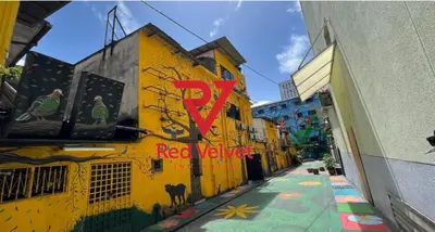 a yellow building with a red x sign on it at Red Velvet Inn Bukit Bintang in Kuala Lumpur