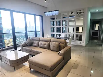 a living room with a couch and a table at ASTORIA AMPANG in Kuala Lumpur