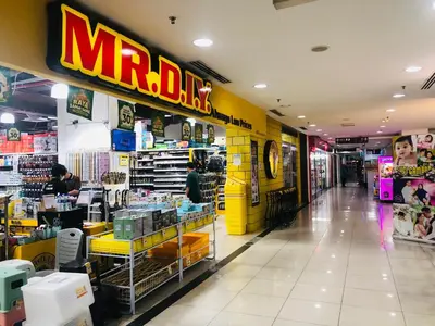 a mcdonalds grocery store with a yellow wall at Duplex Axis Condo @Ampang nearby KLCC. in Ampang