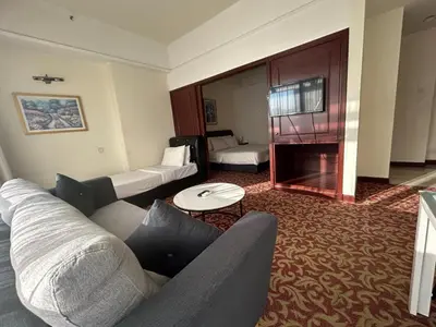 a living room with a couch and a table at PERFECT HOME STAY at TIMES SQUARE in Kuala Lumpur