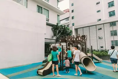 a group of people playing on a playground at Meta @ Swiss Garden Residence KL Bukit Bintang in Kuala Lumpur
