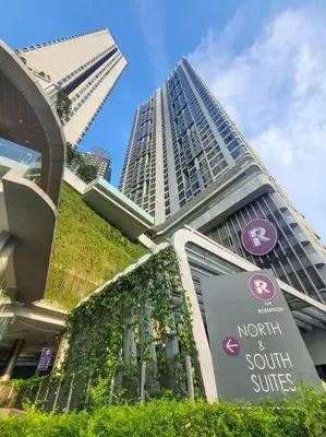 a tall building with a sign in front of it at The Robertson @ 118 Tower Super View in Kuala Lumpur