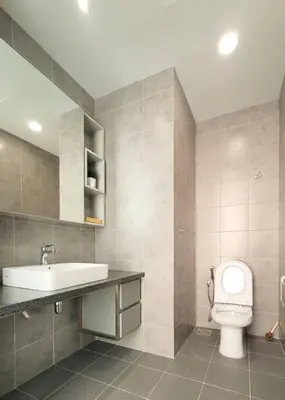 a bathroom with a toilet and a sink at The Robertson @ 118 Tower Super View in Kuala Lumpur