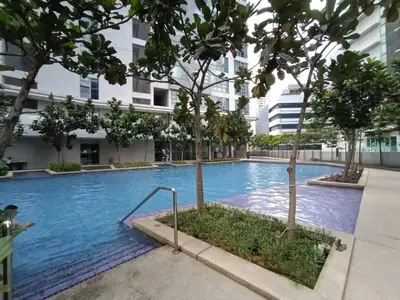 a large swimming pool with trees in a building at The Robertson @ 118 Tower Super View in Kuala Lumpur