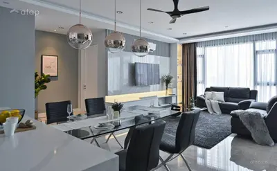 a living room with a dining table and a couch at Royale KLCC in Kuala Lumpur