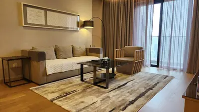 a living room with a couch and a table at Luxurious stay in 188 Fraser Residence Suite in Kuala Lumpur