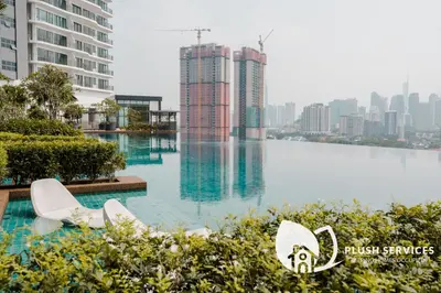 a large body of water with buildings in the background at Datum Jelatek by Plush in Kuala Lumpur