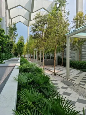 a courtyard with plants in a building at Una Residence by Maya in Kuala Lumpur