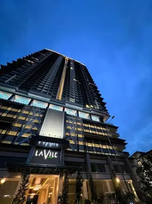 a tall black building with a kle sign on it at Lavile A-Z Property Management Service @ welcome pm for more info in Kuala Lumpur