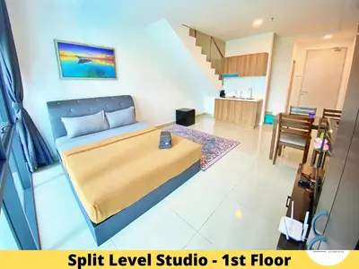 a bedroom with a bed and a dining room at Pacific Homestay Petaling Jaya @ 1 Utama and Universiti Malaya in Petaling Jaya