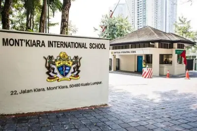 a sign for the mont kaza international school at Inspirasi Mont Kiara 3 Rooms Balcony Free WIFI & Carpark By The Homez in Kuala Lumpur