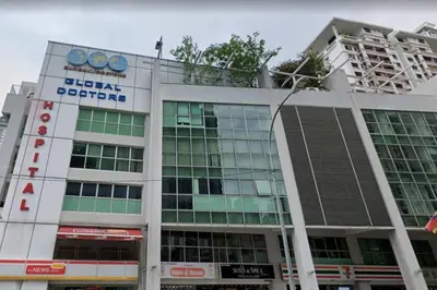 a building with a sign on top of it at Inspirasi Mont Kiara 3 Rooms Balcony Free WIFI & Carpark By The Homez in Kuala Lumpur