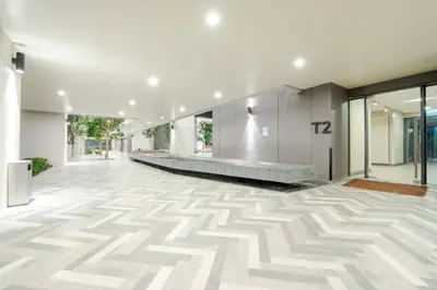 a hallway of a building with a patterned floor at Harmony Luxury Suites At Lucentia Bukit Bintang City Center in Kuala Lumpur