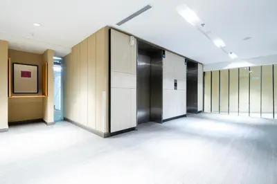 a row of lockers in an office building at Harmony Luxury Suites At Lucentia Bukit Bintang City Center in Kuala Lumpur