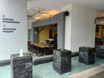 a restaurant with a dining room with a table at 703 KLCC 5 minutes to Alor Street Ceylon Pavilion 3 Room Apt for 10 Pax in Kuala Lumpur