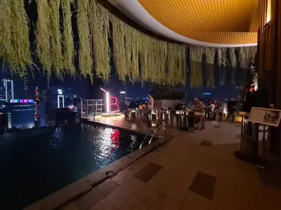 a pool in a building with a view of a city at Romantic Log Cabin 2 - Heart of KL, near KLCC/KL Tower in Kuala Lumpur