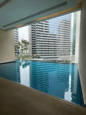 a view of a swimming pool in a building at Binjai 8 Premium Soho, KLCC, nearby LRT by EC in Kuala Lumpur